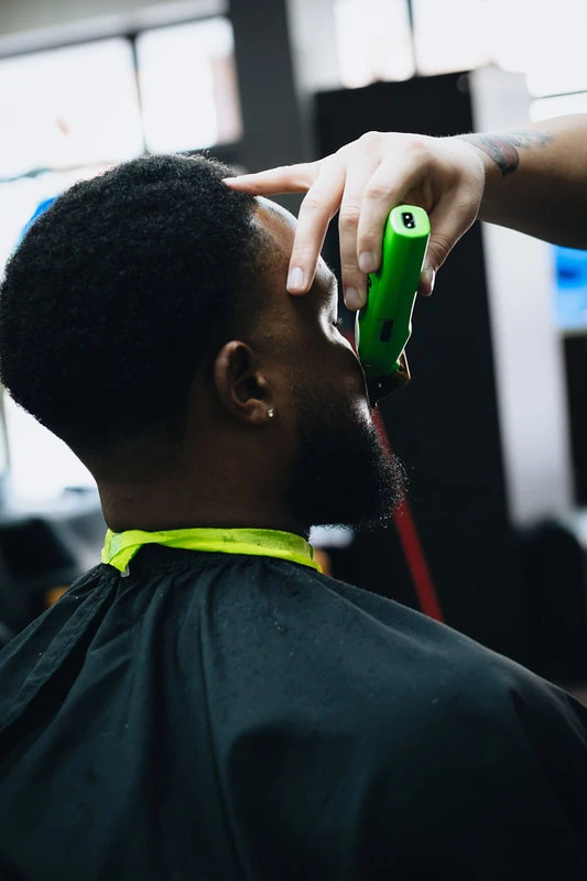 Barber at work — The Barber Club